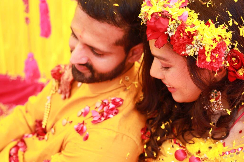 Close up view of bride and groom during haldi ceremony