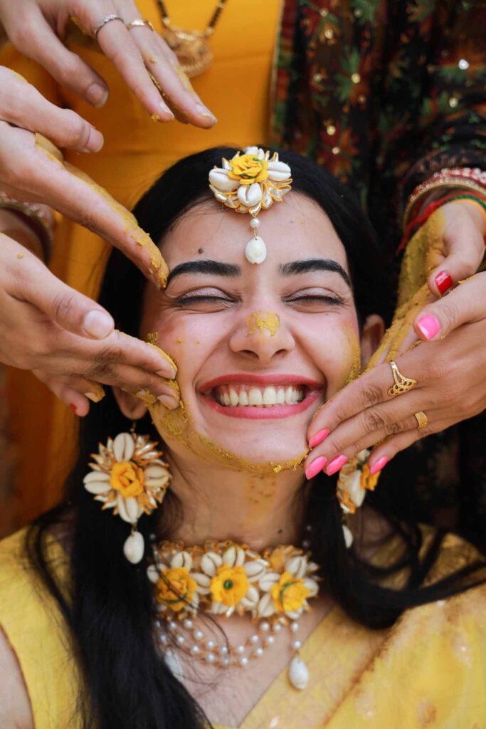 Smiling face of a bride during her haldi