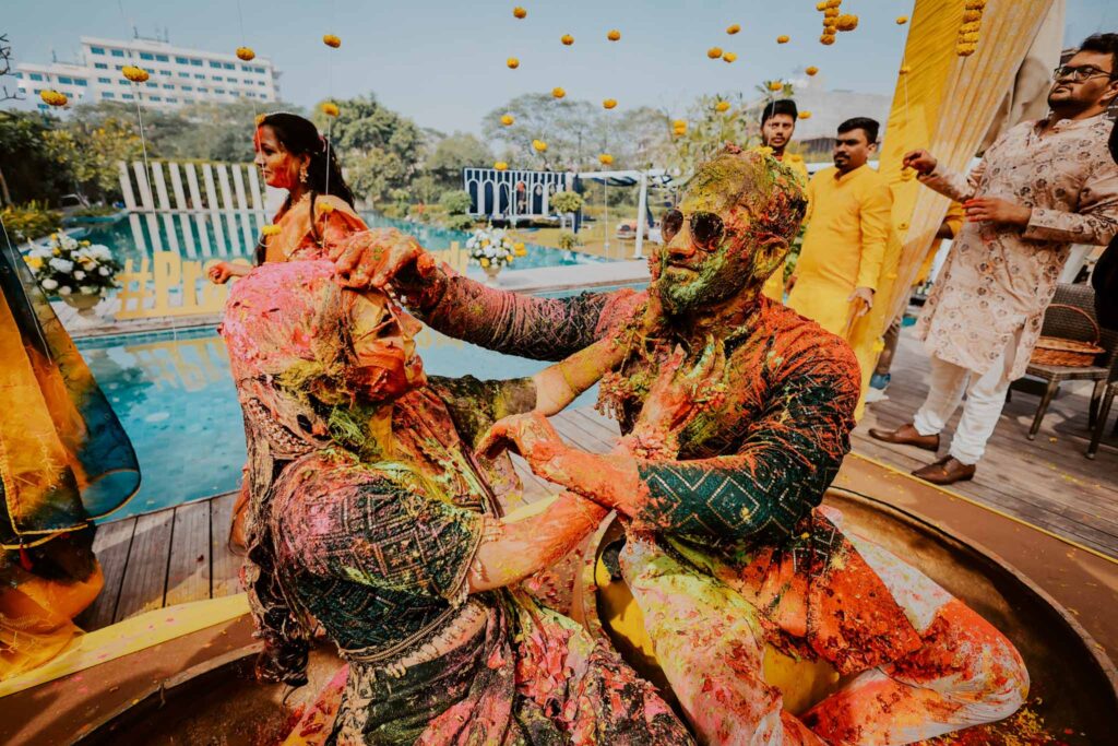Couple playing holi with each other