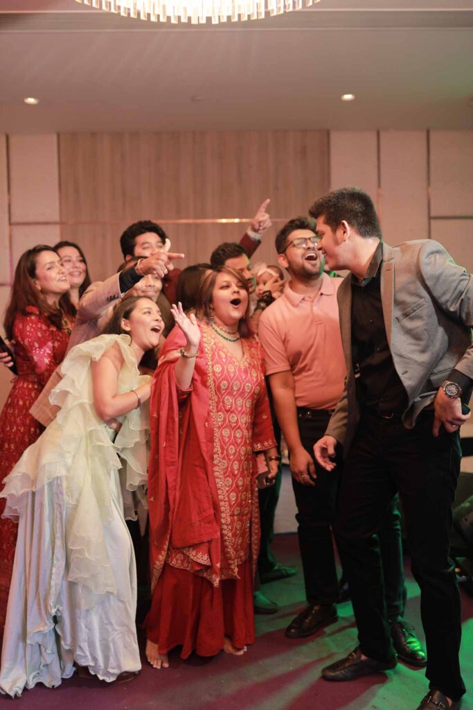 Family having fun at sangeet ceremony